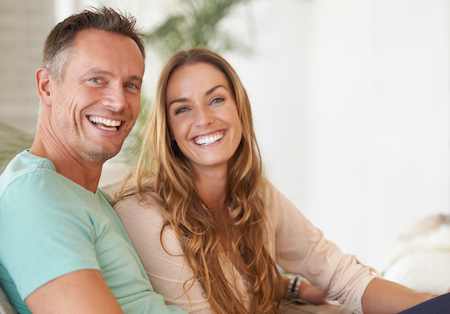 Happy couple with rejuvenated skin